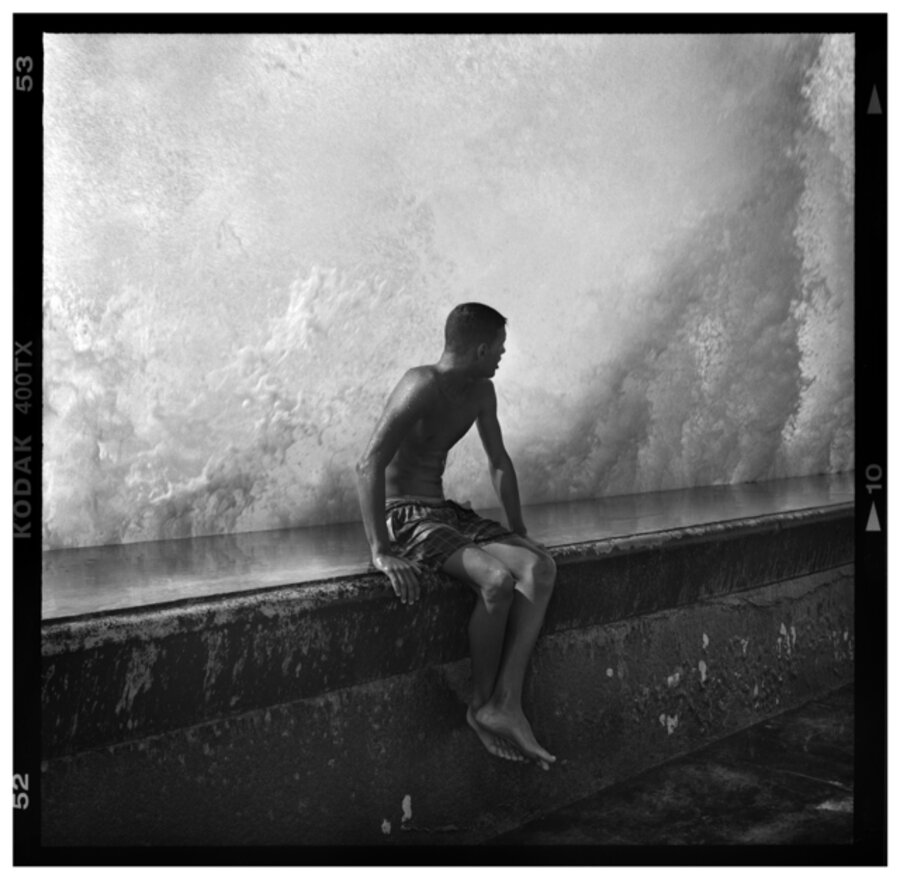 Seated Boy on Malecón Wall, Havana, Cub
