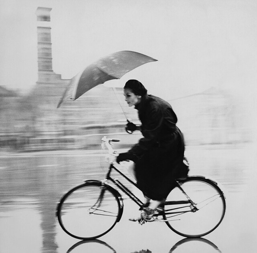 Anne St. Marie on Bike with Umbrella: Taken as a test for The Design Laboratory at the New School taught by Alexey Brodovitch