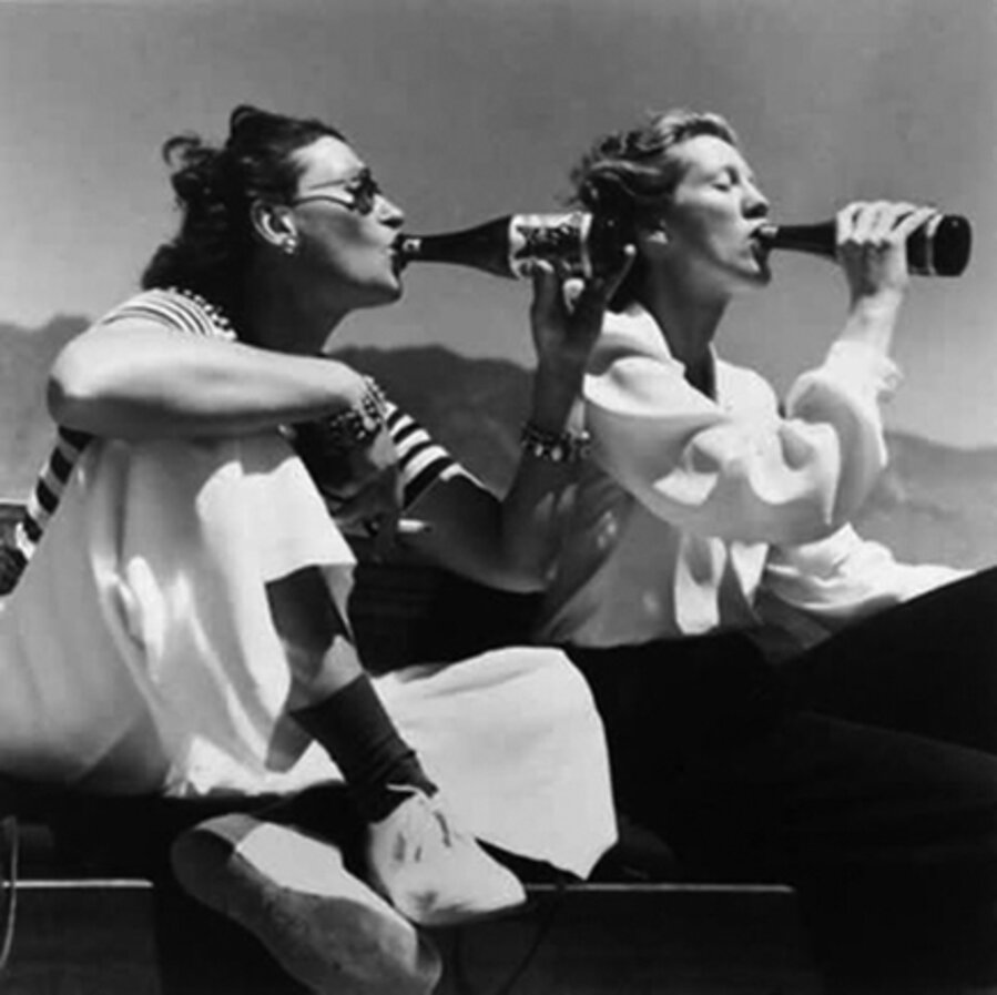 Two Models Drinking Coke