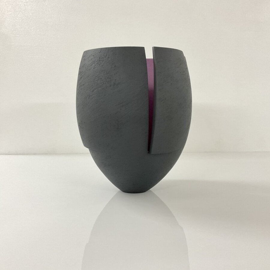 Black Cut and Altered Vessel with Purple Interior