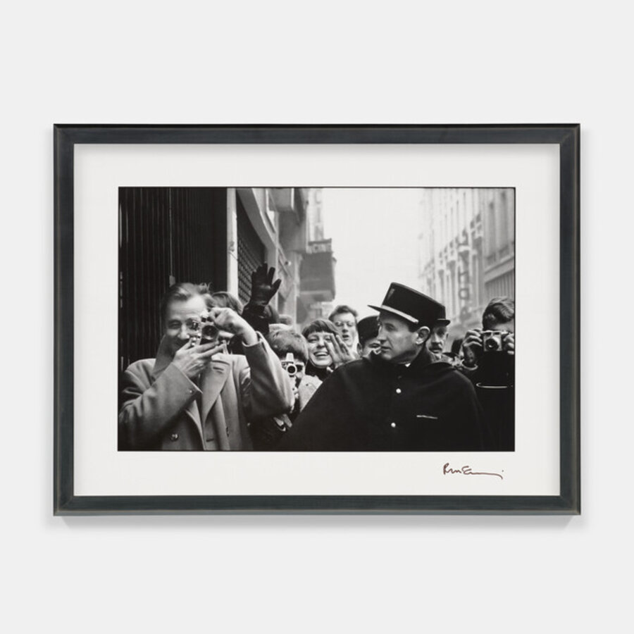 Photographers, fans, and officers, rue de Caumartin, Paris, January 1964