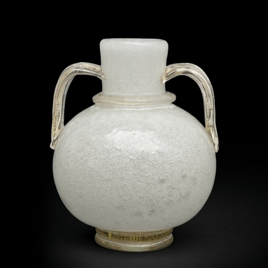 A pulegoso glass vase with handles and base in crystal and gold leaf