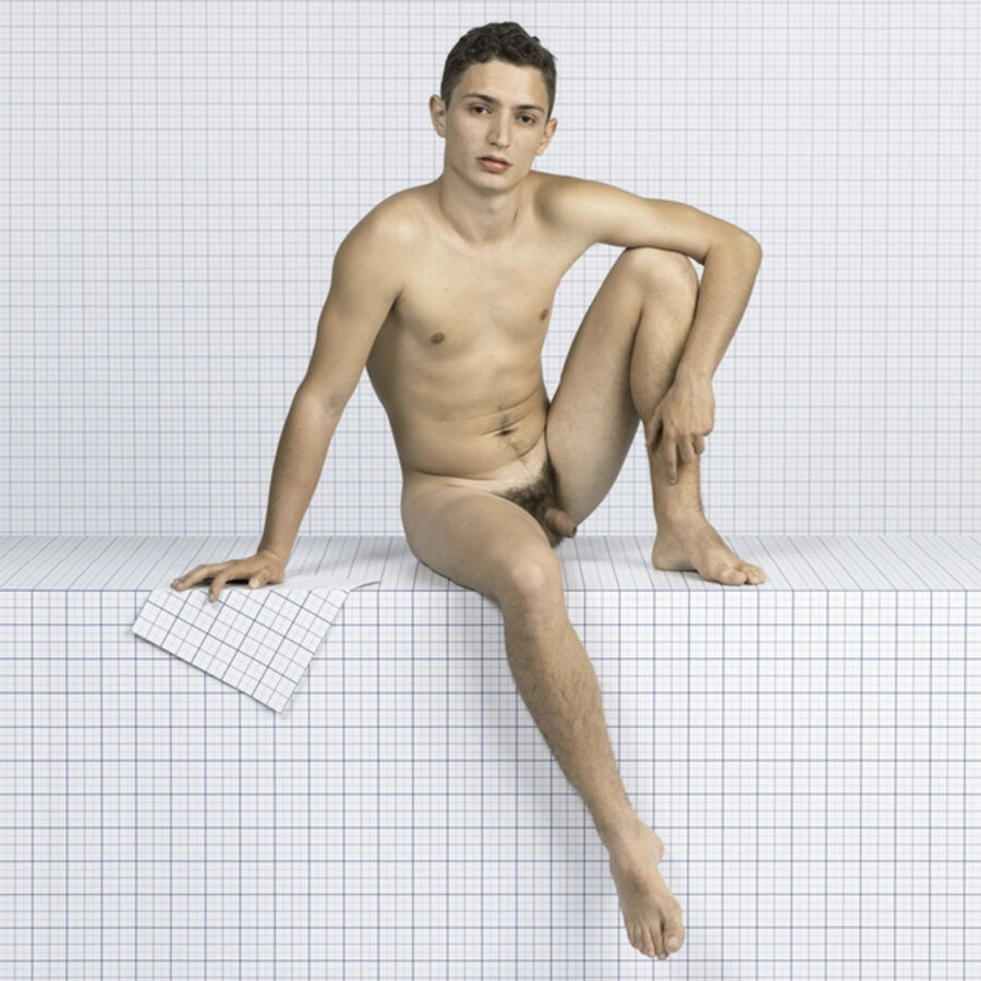 Naked Boy Sitting Down, Looking Towards Camera