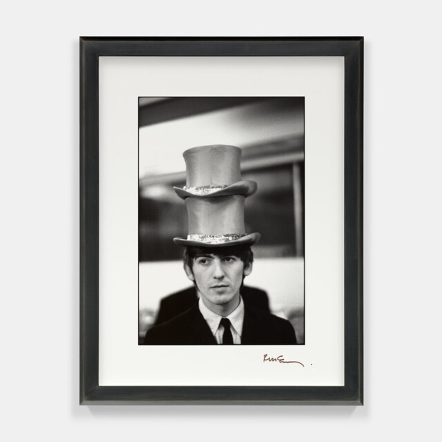 George with two hats, backstage at The Beatles Christmas Show, Finsbury Park Astoria, London, December 1963