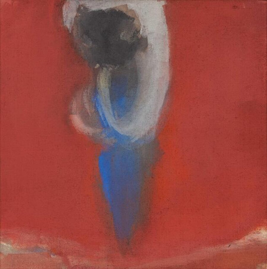 Figur in Feuerrot
