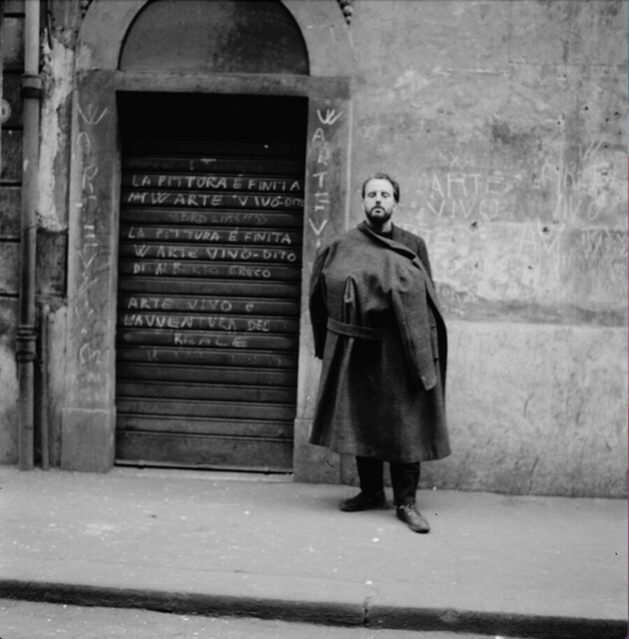 Untitled (Greco next to his handwriting on wall in Rome)