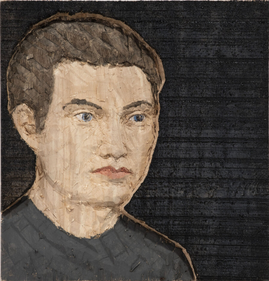 Man with grey t-shirt and grey back-ground