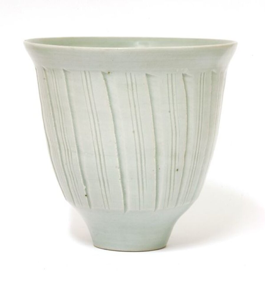 A cut and incised light celadon glazed bowl