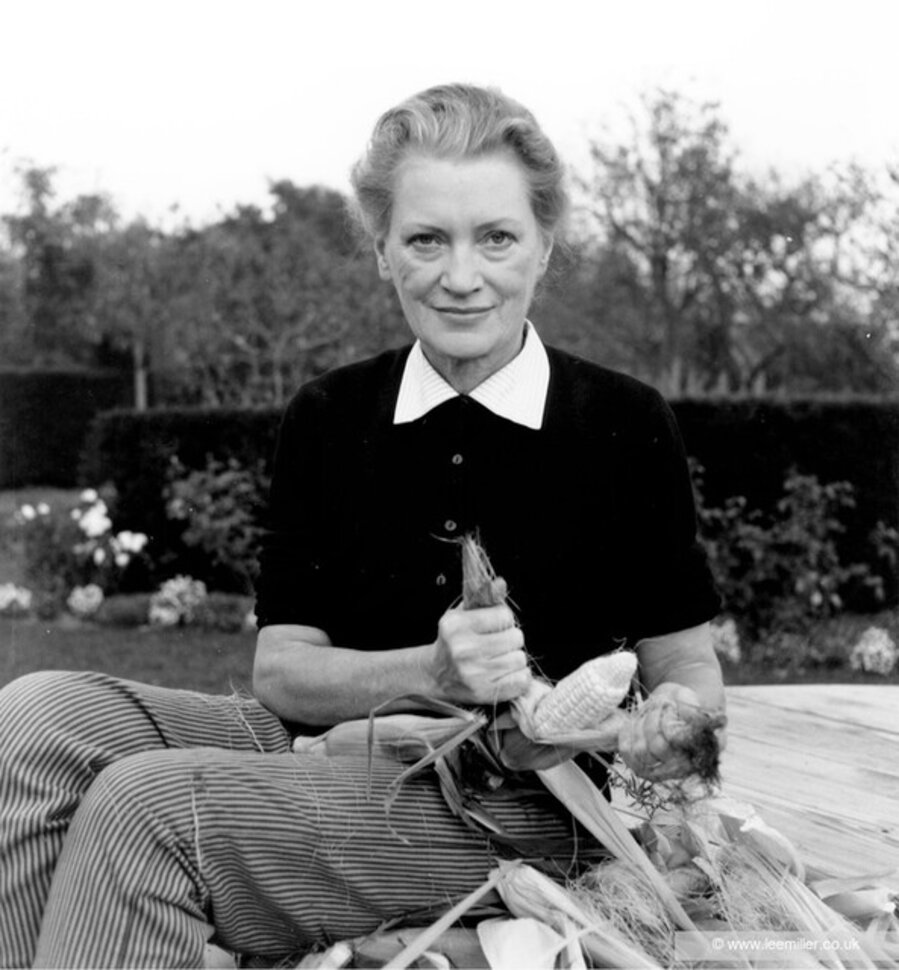 Lee Miller de-husking corn, Farleys Garden, Muddles Green, East Sussex, England c1960