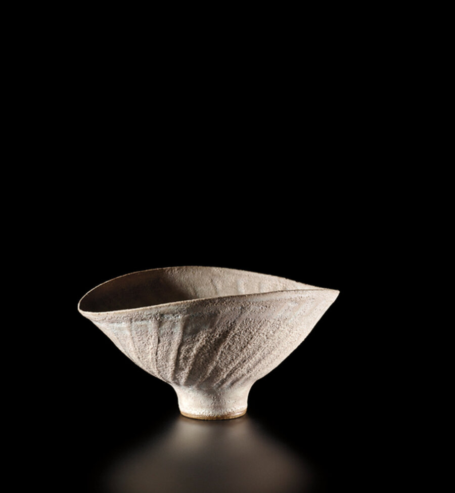 Oval bowl with fluted sides