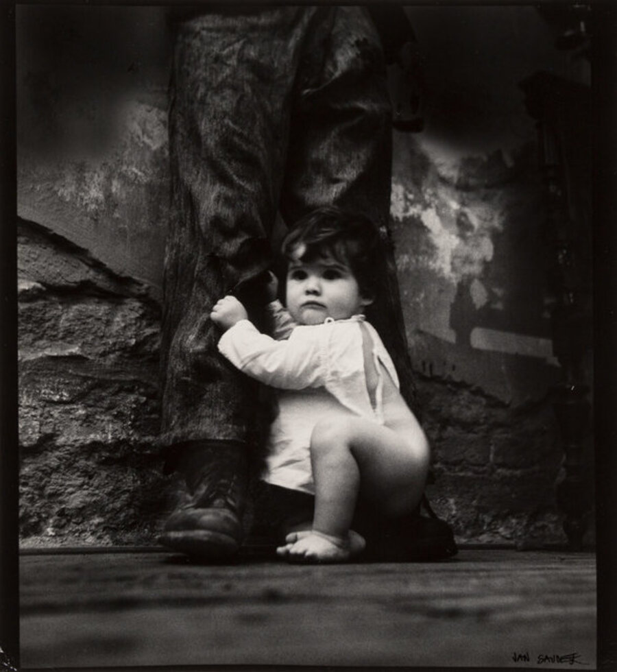 Untitled (Child on Man's Boot)
