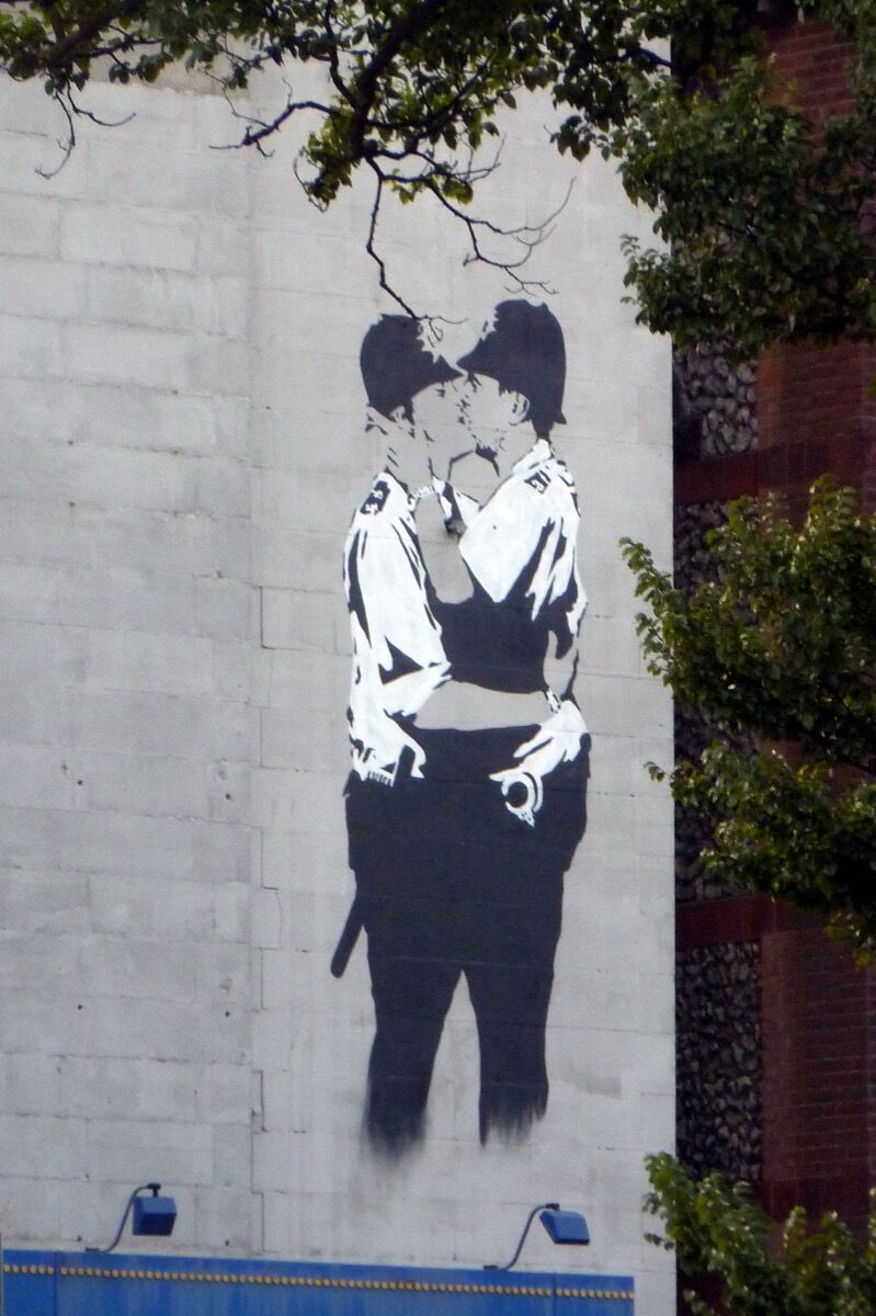 Banksy, Kissing Coppers. Photo by Muffinn, via Flickr. 