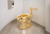 New Yorkers Weigh in on Cattelan’s Gold Toilet at the Guggenheim