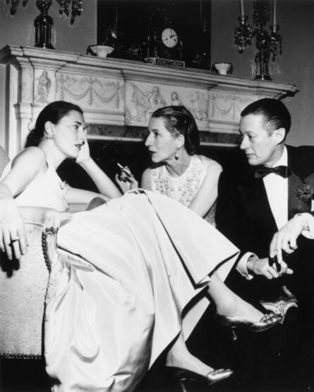 Slim Aarons, ‘Park Avenue Party: Slim Hawks, Diana Vreeland, and her husband Reed Vreeland at Kitty Miller's New Year's Eve party in her home on Park Avenue in New York’, 1952