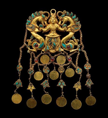 ‘A pair of pendants showing the 'Dragon Master’ Tillya Tepe, Tomb II’, 1st century AD