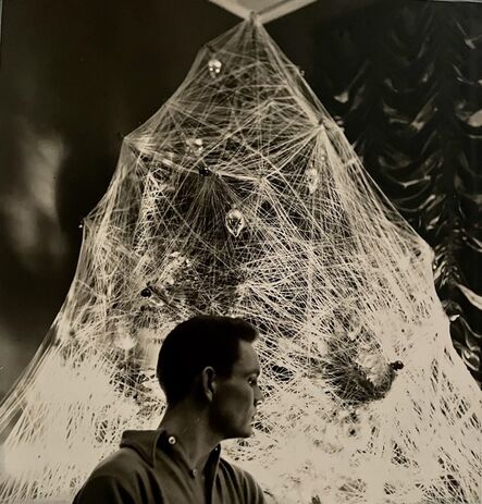 George Platt Lynes, ‘[Chuck Howard Posing Among an Adorned Tree II]’, ca. 1950