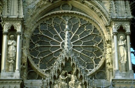 ‘Reims Cathedral: exterior, West facade, detail of rose window and gable over central portal (Coronation of the Virgin)’, ca. 1211-1290