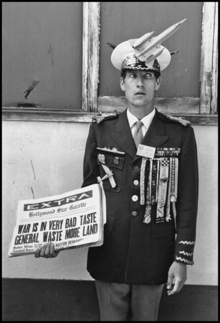 Dennis Stock, ‘Pacifist demonstrating at Santa Monica. "Waste more land" aludes to the name of the US Commander- in- Chief in Vietnam, General Westmoreland. California, USA. ’