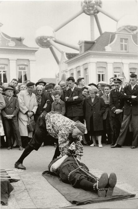 Henri Cartier-Bresson, ‘Escape-Artist Performance in front of Atomium, Brussels World Fair’, 1958
