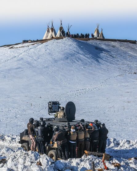 Ryan Vizzions, ‘Protesters face off with police and the National Guard on February 1, 2017, near Cannon Ball, North Dakota.’