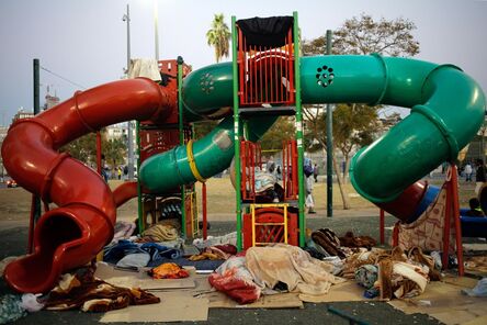 Daniel Bar On, ‘African asylum seekers sleep in a public playground in Southern Tel Aviv. Many asylum seekers arrived at the southern neighborhoods of the city, leading to tensions with local residents. February, 2014’, 2014