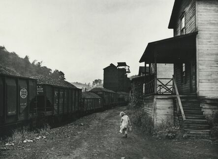 Marion Post Wolcott, ‘Unemployed coal miner's daughter carrying home can of kerosene. Company housing, Scotts Run, W. Va.’, 1938