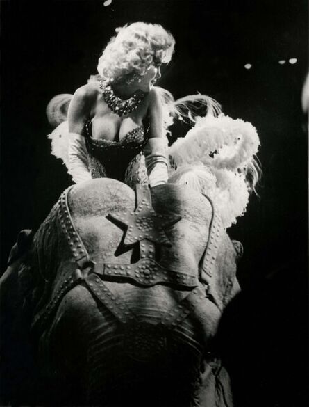 Weegee, ‘Marilyn Monroe Riding the Elephant’, ca. 1955