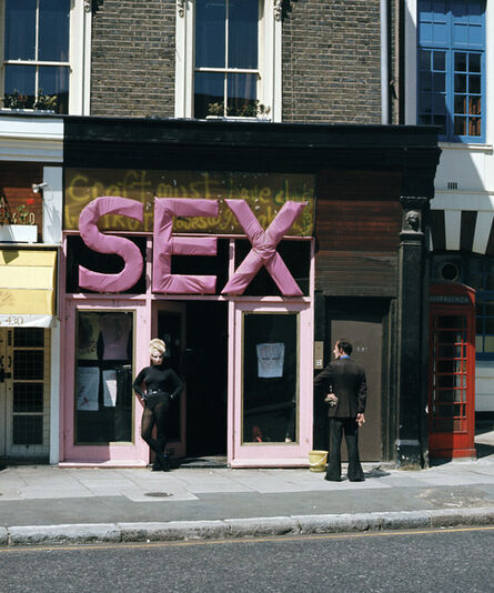 Sheila Rock, ‘Jordan in the 'SEX' doorway (with man watching), King's Road, London’, ca. 1976