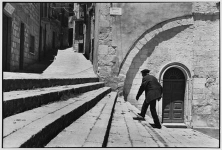 Leonard Freed, ‘Man climbs stairs, Madonie Mountains, Petralina Sottana, Sicily, Italy ’, 1974