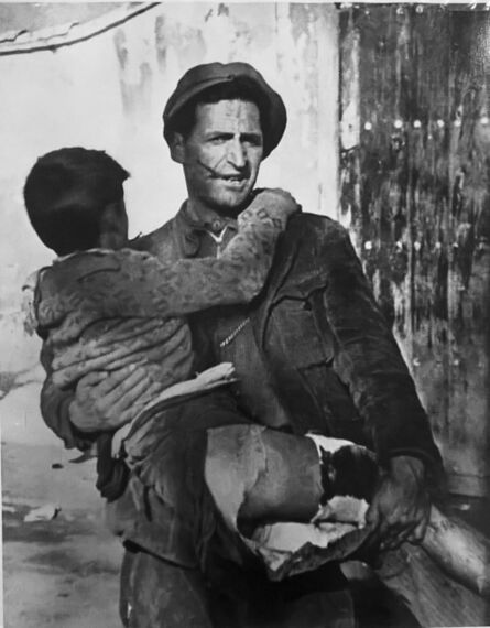 Robert Capa, ‘Soldier carrying child, Spanish Civil War’, 1937