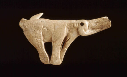 ‘Spear thrower made from reindeer antler, sculpted as a mammoth. Found in the rock shelter of Montastruc, France’, ca. 11,000 – 13,000 BCE