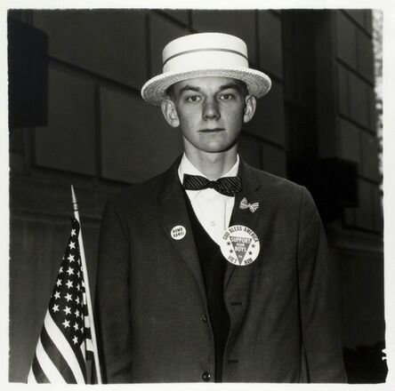 Diane Arbus, ‘Boy with a straw hat waiting to march in a pro-war parade, New York City’, 1967