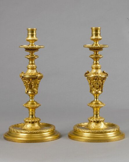 ‘An exceptional and very rare pair of large Louis XIV baluster-shaped chased and giltbronze candlesticks’