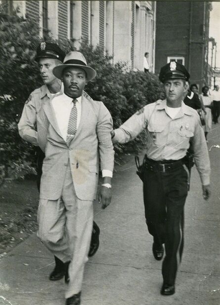 Charles Moore, ‘Two Police Officers, Unaware Of Their Prisoner’s Identity, Hustle Dr. Martin Luther King Away From The Montgomery Courthouse Where He Had Been Arrested For Loitering’, 1958