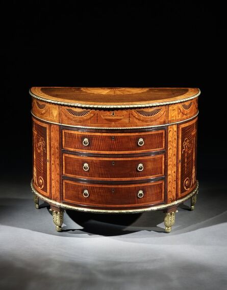 English, ‘A GEORGE III ORMOLU MOUNTED SATINWOOD AND HAREWOOD MARQUETRY COMMODE ATTRIBUTED TO MAYHEW & INCE ’, ca. 1775