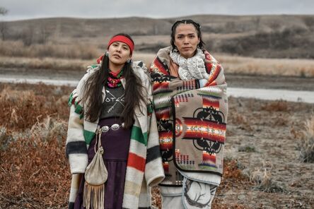 Ryan Vizzions, ‘Two Dine women hold strong in sovereignty, only speaking their ancestral language at Turtle Island, Thanksgiving, 2016’