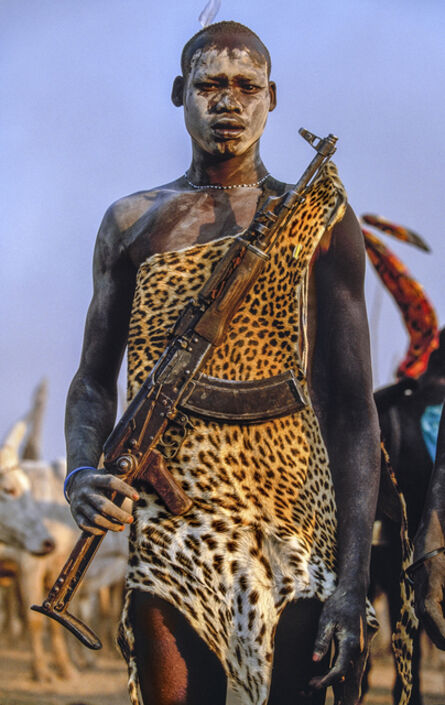 Carol Beckwith and Angela Fisher, ‘Dinka Warrior with Leopard Skin and Kalashnikov Rifle, South Sudan’, 2006