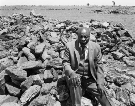 David Goldblatt, ‘Luke Kgatitsoe at his house, bulldozed in February 1984 by the government after the forced removal of the people of Mapoga, a black-owned farm, which had been declared a “black spot”, Ventersdorp district, Transvaal.’, October 21-1986