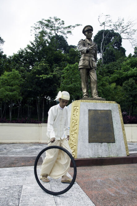Moe Satt, ‘Bicycle Tire Rolling Event from Yangon: Bogyoke’s Bronze Statue’, 2013