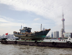 The Ninth Wave sailing on the Huangpu River by the Bund, Shanghai