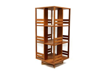 ‘A late 20th century teak revolving bookcase’