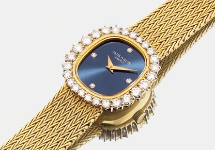 Patek Philippe, ‘A very fine and elegant lady’s yellow gold wristwatch with bracelet, diamond-set bezel and indexes, sunburst blue metallic dial and bracelet’, 1981