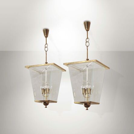 ‘A pair of pendant lamps with a brass structure and glass shades’, 1950 ca.
