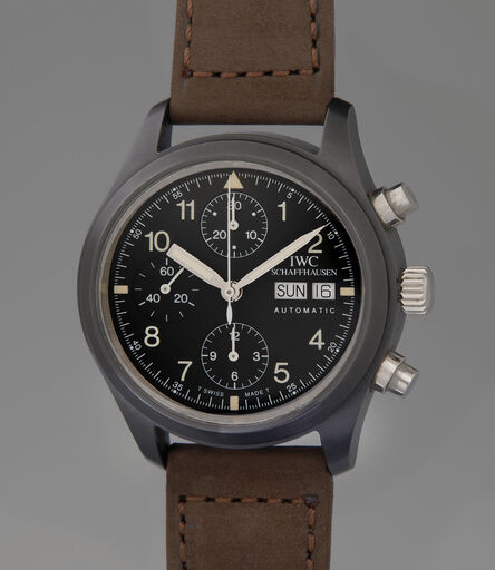 IWC, ‘A rare and attractive limited edition ceramic and stainless steel chronograph wristwatch with day and date, accompanied by an guarantee and presentation box’, 1997