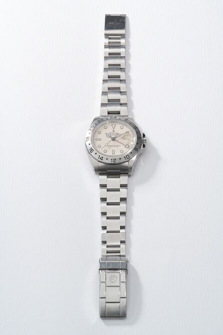 Rolex, ‘A highly attractive and rare stainless steel wristwatch with “ivory rail” dial, 24-hour indicator, sweep center seconds, date, bracelet and guarantee’, Circa 1990