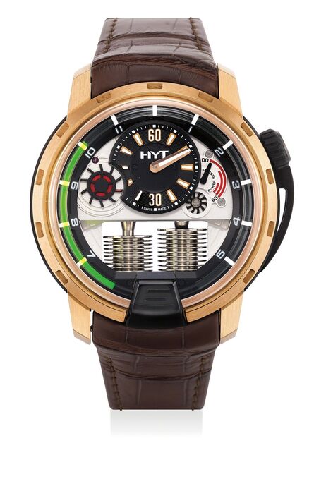 HYT, ‘A fine and rare pink gold and titanium semi-skeletonized wristwatch with retrograde fluorescent liquid capillary time indicator, power reserve indicator, international warranty certificate and presentation box’, Circa 2012