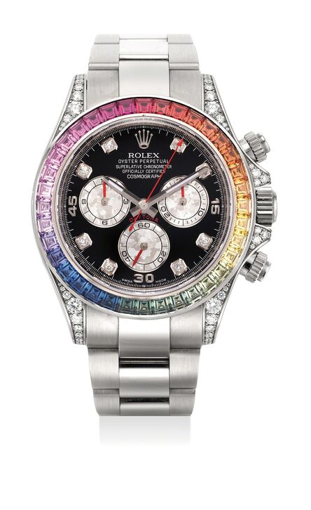 Rolex, ‘An extremely rare and attractive white gold, diamond and rainbow-colored-gem-set chronograph wristwatch with bracelet, original guarantee and box’, Circa 2013