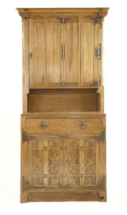 ‘A Continental Arts & Crafts oak bookcase’