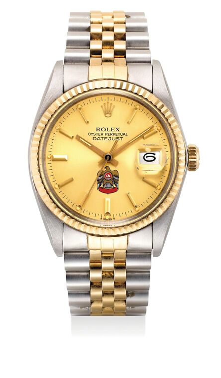 Rolex, ‘A fine and rare two-tone stainless steel and yellow gold wristwatch with date, sweep center seconds, bracelet, warranty and presentation box, dial with emblem of Abu Dhabi’, Circa 1983