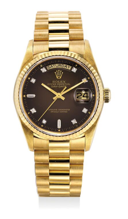 Rolex, ‘A very fine and rare yellow gold and diamond-set wristwatch day, date, sweep center seconds, bracelet, dégradé dial, guarantee and box’, Circa 1987